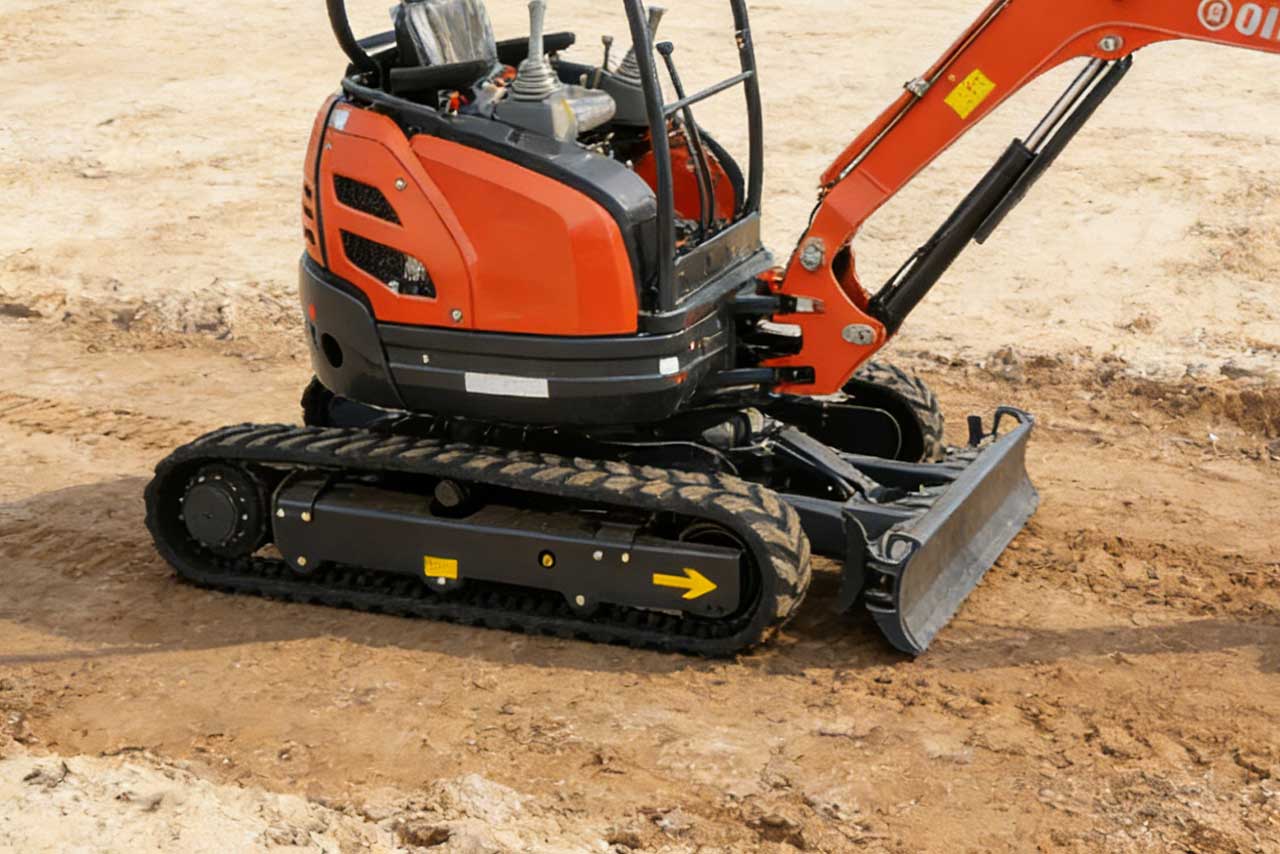 Compact excavator undercarriage, tracks and dozer blade