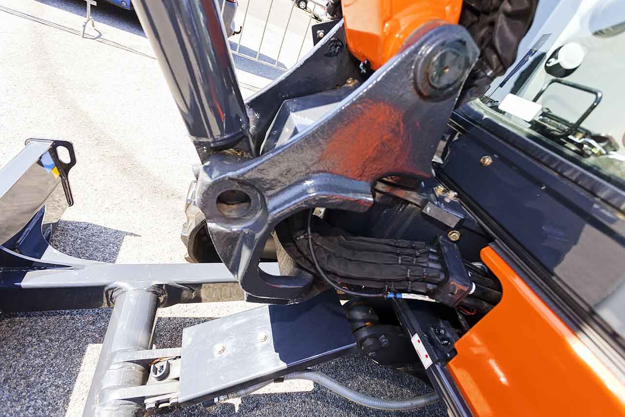 Close view of a compact excavator linkage
